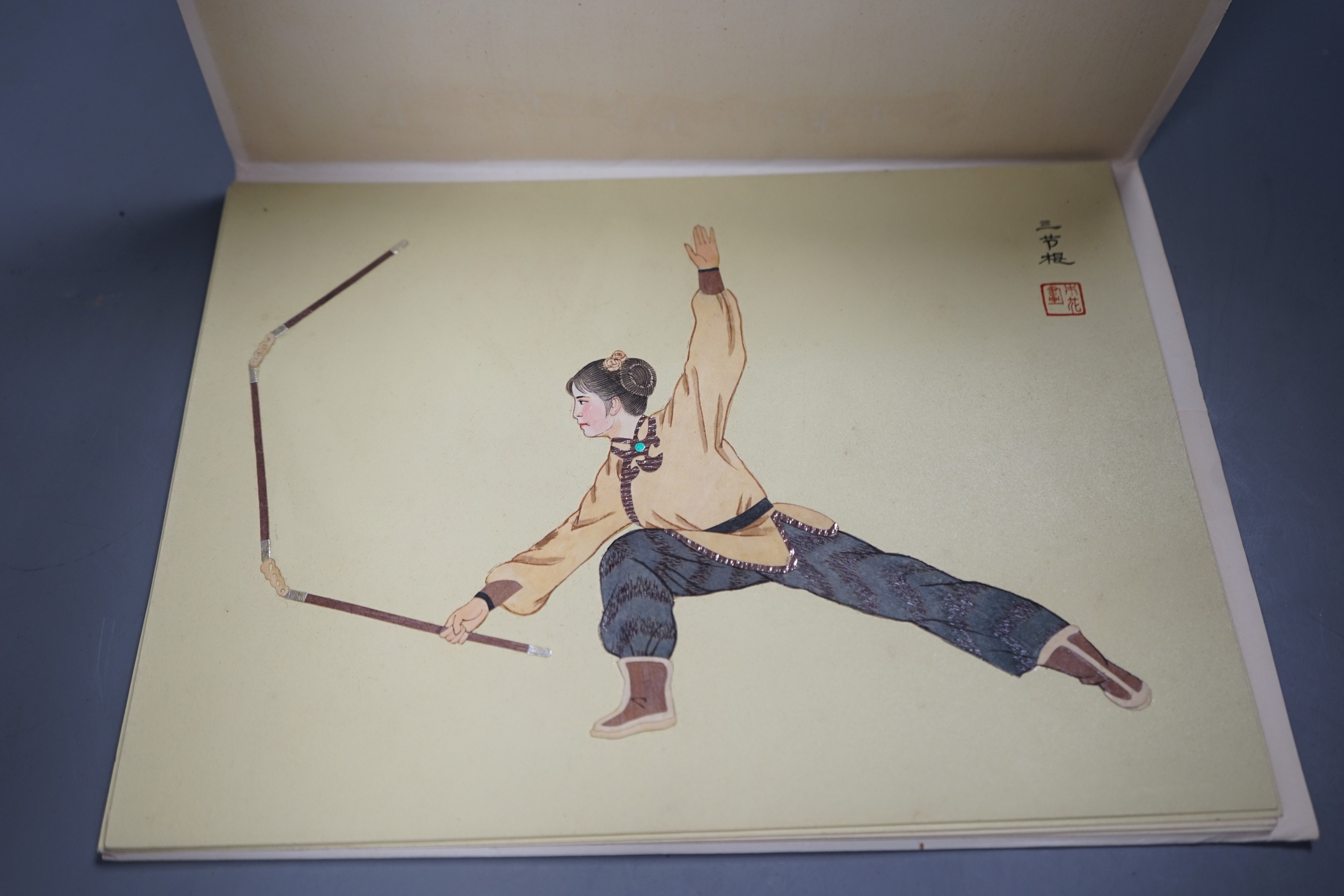 A set of six Chinese woodblock and painted pictures of martial arts, 30cms wide x 22cms high